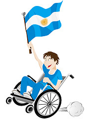 Image showing Argentina Sport Fan Supporter on Wheelchair with Flag