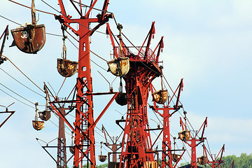 Image showing industrial cableway and moving trolleys