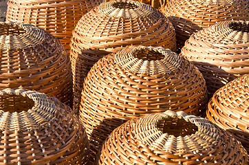 Image showing Wicker handmade wooden basket sell street market 