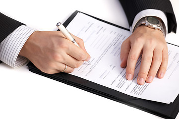 Image showing Businessman signing a contract