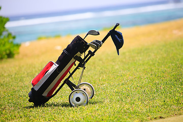 Image showing Golf bag on coastal field