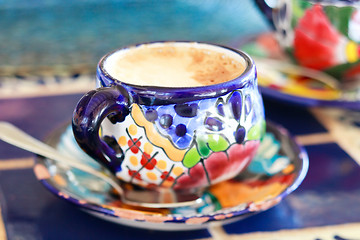 Image showing Cappuccino served in colorful cup