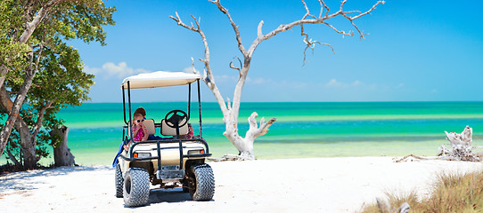 Image showing Golf cart at tropical beach