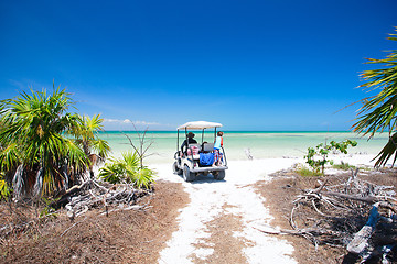 Image showing Golf cart at tropical beach