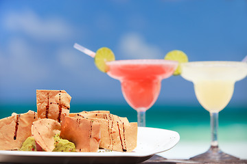 Image showing Tortilla chips and margarita cocktails