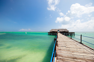 Image showing Wooden jetty leading to ocean