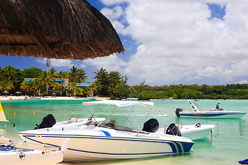 Image showing Boats at tropical beach resort