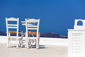 Image showing White Chairs And Table