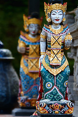 Image showing Two Balinese statues