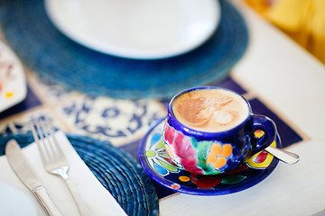 Image showing Cappuccino served in colorful cup