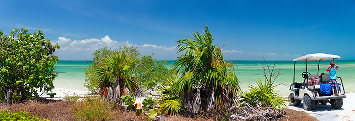 Image showing Golf cart at tropical beach