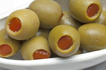 Image showing olives filled with red paste