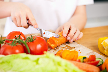 Image showing Child making salad