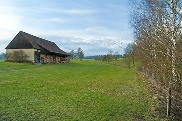 Image showing barn with fuel wood