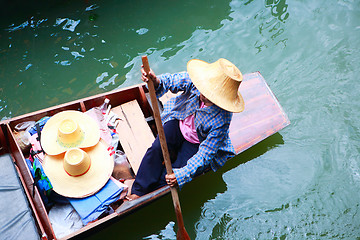 Image showing Vendor on traditional floating market in Thailand