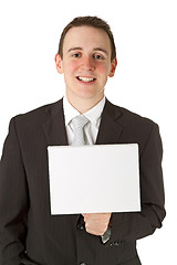 Image showing Businessman holding a whiteboard