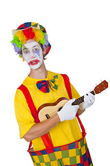 Image showing Colorful clown with ukulele