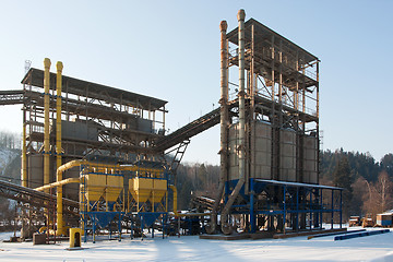 Image showing Stone quarry with silos, conveyor belts in winter