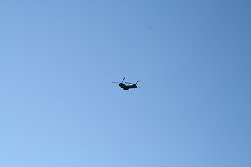 Image showing Helicopter against blue sky