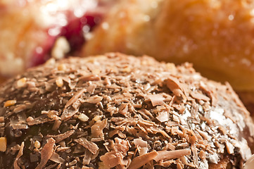 Image showing Berliner with almond and chocolate slivers