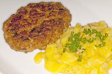 Image showing Hamburger with potato salad