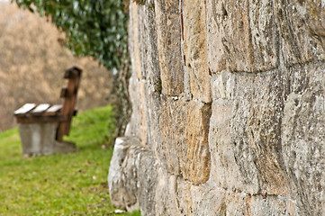 Image showing  wall with park bench