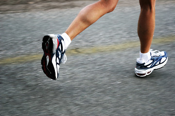 Image showing Feet of a running woman