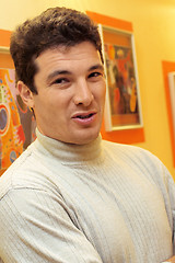 Image showing Young man in his studio