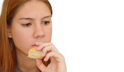 Image showing Girl with a piece of bread