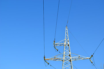 Image showing electricity wire and pole in background blue sky 