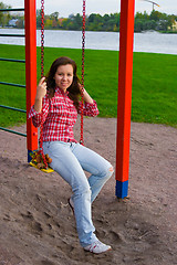 Image showing happy young woman on playground