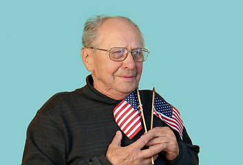 Image showing Senior man with american flag