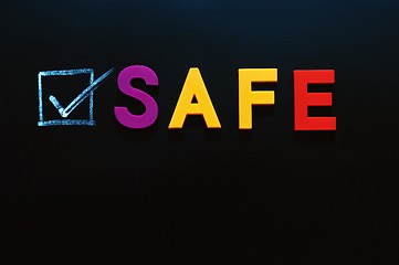 Image showing Safe with a check box