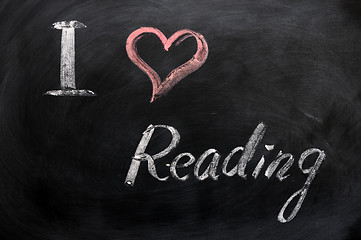 Image showing I love reading - text written on a blackboard