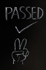 Image showing Passed with a victory gesture