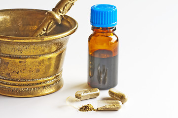 Image showing tincture and pills
