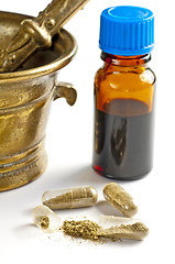 Image showing tincture and pills