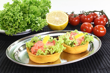 Image showing baked Cup corn with salmon salad