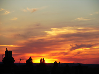 Image showing sunset rooftop silhouette-1566