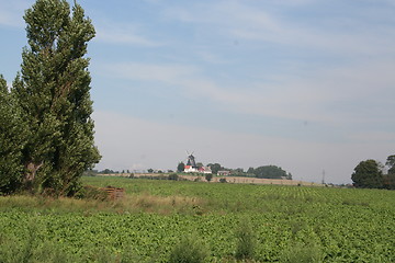 Image showing Landscape view with windmill