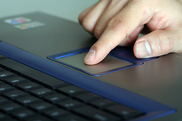 Image showing Businessman and laptop