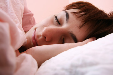 Image showing Beautiful young woman sleeping.