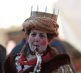 Image showing Funny woman saxophonist