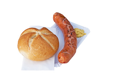 Image showing German Bratwurst with bun and mustard