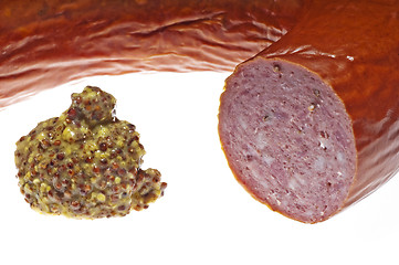Image showing Kielbasa with french mustard