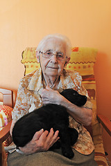 Image showing  senior and puppy