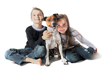 Image showing children and  jack russel terrier