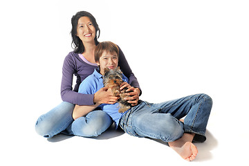 Image showing yorkshire terrier and asian family