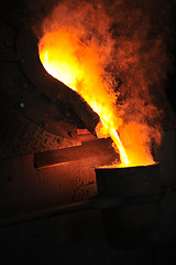 Image showing Foundry - molten metal poured from ladle for casting