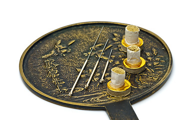 Image showing acupuncture needle with moxa cones